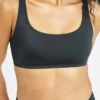 The All-You Swim Bralette: Black -Livery Store 1 on model front all you swim bralette jet black