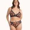 The Busty Bralette: Poppy Floral -Livery Store 1 on model front busty bralette print poppy floral c55ab22e feac 459e ba59 7e1de3feedbe