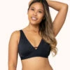 The Eco Deep V Bralette: Jet Black -Livery Store 1 on model front eco deep v bralette jet black