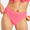 The Swim Ruched High Waist Bikini Bottom: Electric Pink -Livery Store 1 on model front swim ruched high waist bikini bottom electric pink