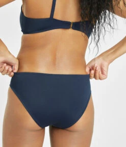 The Swim Bikini Bottom: Navy -Livery Store 3 on model back swim bikini bottom navy