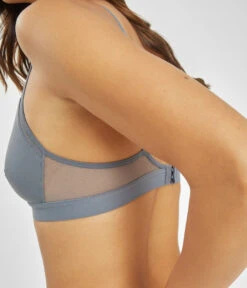 The Mesh Trim Padded Bralette: Smoke -Livery Store 3 on model side mesh trim padded bralette smoke