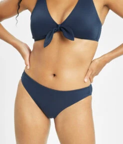 The Bralette & Bikini Swim Bundle: Navy -Livery Store 6 on model front swim bikini bottom navy 84718d03 678e 4c3e 9317 962593482a43